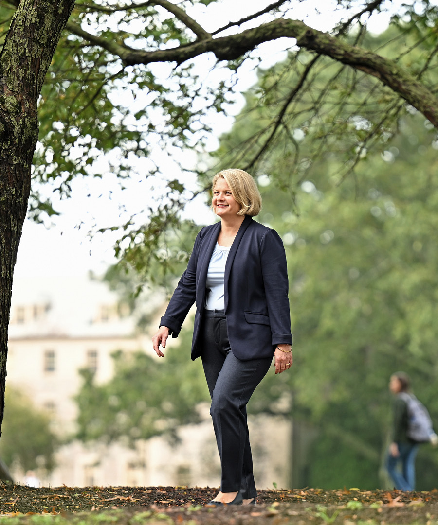 President Chapdelaine walking through campus