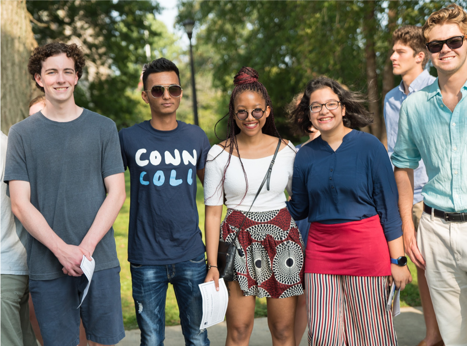 Samirah and her classmates pose for a photo outside 