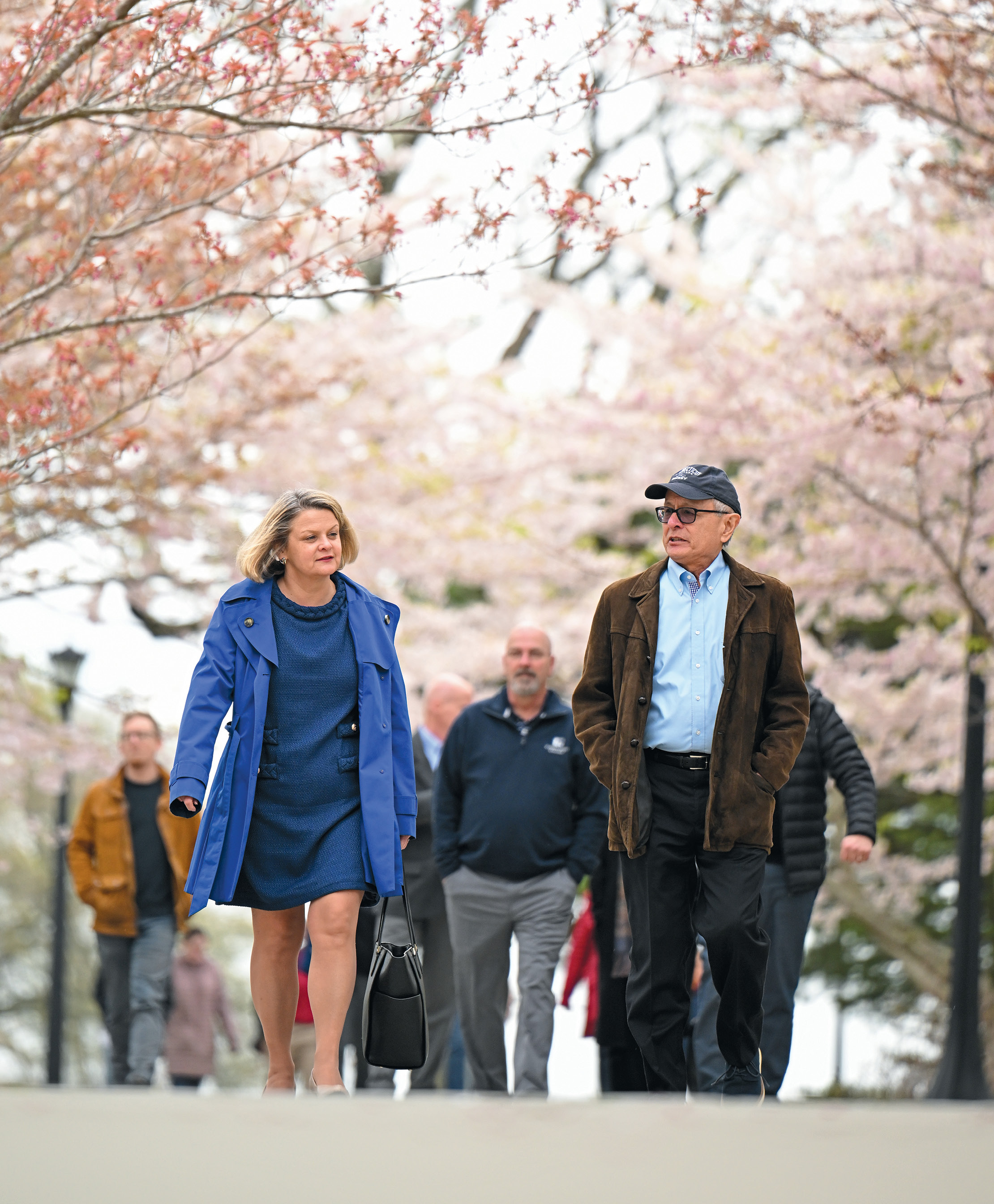 President-elect Andrea Chapdelaine walks with interim president Les Wong.