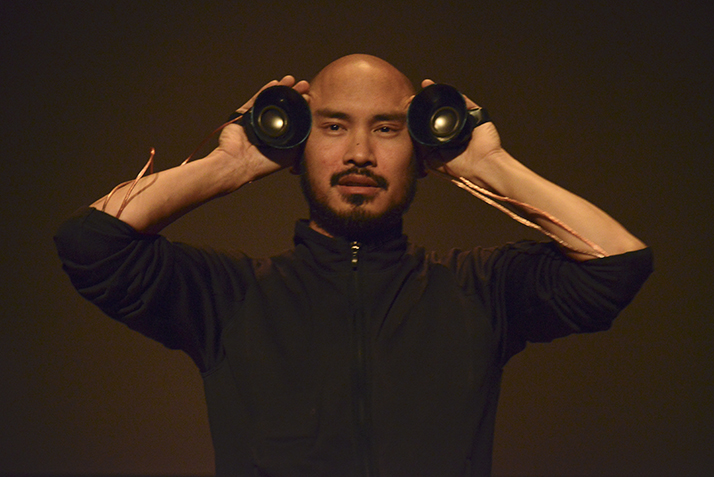 A man performs at the Ammerman Center Symposium 