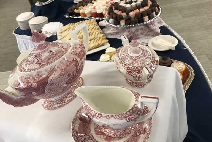 A close up of an ornate tea set