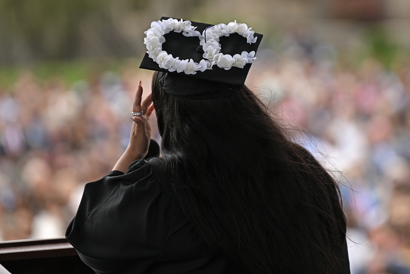 A detail photo of student speaker Giana De La Cruz's graduation cap